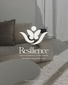 the logo for resilince is displayed in front of a couch and coffee table