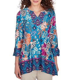 From Ruby Rd.&#x2C; this tunic top features:Knit fabricationFloral & contrast border printV-neckline with fringe trim detail3/4 sleeves with flounce cuffsSharkbite hemlinePullover constructionPolyester/spandexHand washImported. Multicolor V-neck Tunic For Fall, Printed Viscose V-neck Top, Printed V-neck Tunic, Multicolor Printed Split Neck Top, Printed V-neck Rayon Tops, Bohemian V-neck Viscose Top, Bohemian Viscose V-neck Top, Fall Multicolor V-neck Tunic, Multicolor Viscose V-neck Blouse