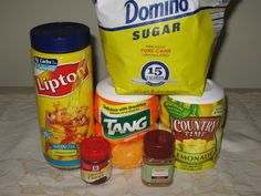 the ingredients needed to make this dish are neatly arranged on a bed sheet, including cornflakes, mayonnaise, and other condiments