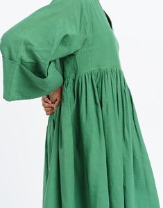 Oversized midi dress in mood elevating basil green color is tailored from handwoven cotton fabric by women artisans of India's western region. Designed for year-round utility, finished with subtle gathers at the waist to give the boxy fit additional contour. This dress would be ideal for transition weather and semi-formal settings. Western Region, Women Artisans, Semi Formal, Midi Length, Green Color, Basil, Green Colors, Color Pop, Cotton Fabric