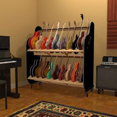 there are many guitars on the shelf in this room, and one piano is next to it