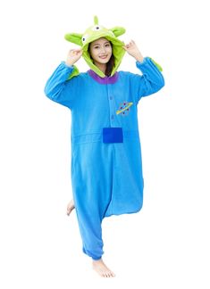 a person in a costume that is wearing a frog on it's head and holding his hands up to the side