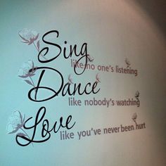 there is a sign on the wall that says sing like no one's listening