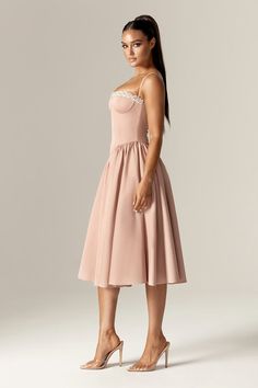 Katherine, is THE dress for romantic date nights and has the prettiest silhouette and it’s your perfect for all seasons.The bodice is fitted with the waist cinching corset bones and has a pretty sweetheart neckline with rhinestone embellishment on the bust. Fitted with tulle to hold the shape, we love how the voluminous midi skirt is gently gathered to flatter your legs.'Katherine' has pockets and is fully lined for comfort It zips to the back for easy on and looks ultra feminine styled with cle Pink Corset Dress With Sweetheart Neckline For Summer, Pink Corset With Sweetheart Neckline For Spring, Spring Corset Dress With Boned Bodice And Heart-shaped Neckline, Feminine Pink Corset With Sweetheart Neckline, Flirty Mini-length Corset With Boned Bodice, Ultra Feminine Style, Corset Boning, Midi Sundress, Ultra Feminine