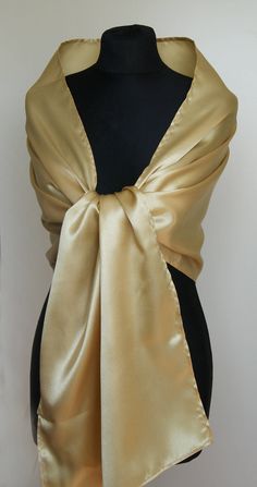 A very elegant satin shawl for your wedding party or evening dress. Made of luxury satin, slightly sparkles on the sun or light. Color: gold ( other colors are available ) Size : 170 cm x 45 cm You can use it as a wrap, shawl or stola. WE have matching satin bags in Etsy Shop! WE accept credit cards! Luxury Gold Shawl For Wedding, Classic Gold Silk Scarf, Classic Silk Shawl For Formal Occasions, Gold Fitted Shawl For Party, Fitted Gold Shawl For Party, Formal Solid Satin Silk Scarf, Formal Solid Color Satin Silk Scarf, Silk Scarf With Satin Finish For Wedding, Classic Gold Silk Scarf For Formal Occasions