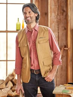 This 10-Pocket Vest Has a Place for Everything to Keep ?Outdoor Essentials Organized and at the Ready Fall Utility Vest For Outdoor Work, Utility Vest For Outdoor Work In Fall, Fall Vest With Side Pockets For Outdoor Activities, Fall Outdoor Vest With Side Pockets, Cargo Pocket Vest For Outdoor Activities In Fall, Outdoor Cotton Vest With Patch Pockets, Outdoor Work Vest With Pockets For Fall, Fall Outdoor Cargo Vest, Sleeveless Outdoor Work Vest For Fall