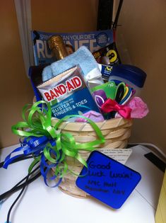 a basket filled with personal care items on top of a table next to a sign