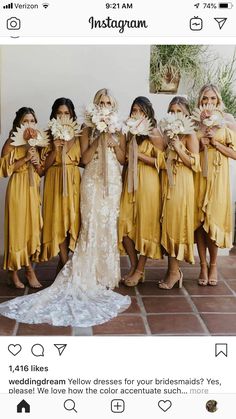 a group of women standing next to each other holding flowers in front of their faces