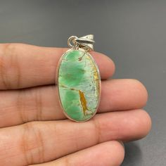 ITEM DESCRIPTION  GEMSTONE NAME :- Australian Variscite SHAPE :- Oval SILVER :- 92.5 Sterling Silver SIZE :- 36x19x6 MM Approx. WEIGHT :- 34 Carat Approx. Color May Be Change Different 20% ( VISIT MY SHOP FOR MORE PENDANT ) https://www.etsy.com/in-en/shop/TACGEMS?ref=seller-platform-mcnav&section_id=28321421 TACGEMS are manufactures & suppliers Stone Beads, Gem Stones and any form of cabochons. We specialize in making jewelry stones in any style / design with any form of customizations and personalization, we share a good understanding with the designers, to help them deliver what they desire. We achieved the heights of power and excellence within the style and manufacture of Gems Stones. Operational from Jaipur (India), as a manufacturer and suppliers of gem stones, the organization guara Large Oval Green Gemstones, Oval Green Natural Gemstones, Green Oval Natural Gemstones, Oval Green Gemstones For Jewelry Making, Untreated Oval Silver Gemstones, Jewelry Stones, Bridesmaid Gift Boxes, Travel Jewelry Box, Mixed Metal Jewelry