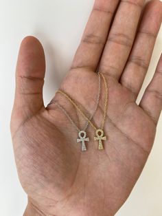 New item & free shipping! This dainty ankh necklace is just gorgeous and it features the following attributes: ✨ Genuine .925 Sterling Silver. ✨ Natural Cubic Zirconia that never lose shine or dull. ✨ 14K Gold Plated over Sterling Silver (optional). ✨ Hypoallergenic. ✨Tarnish resistant, perfect for everyday wear. ��✨ Adjustable length; can be worn as a 16 inch or 18 inch. Ankh symbol: ✨ The Ankh is known as the symbol of life, it is worn as a form of protection from bad energies and it is said to Ankh Jewelry, Ankh Symbol, Ankh Necklace, Belly Piercing Jewelry, Egyptian Jewelry, Protection Necklace, Jewelry Fashion Trends, Mens Accessories Jewelry, Dream Jewelry