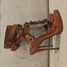 Authentic Giuseppi Zanotti Wrap Around Strappy Sandals Heels. Color: Brown. Size: 36.5. Preowned Never Used Only Tried On. From 2014. No Box Or Dustbag. All Items From My Personal Collection. From A Smoke Free Pet Free Home. Same Day/Next Day Shipping. No Trades. Thanks For Looking. Tags: Zanotti, Zanotti Heels, Zanotti Shoes, Giuseppi Zanotti, Brown Heels, Strappy Heels, Sandals, Strappy Sandals, Brown Sandals, Brown High Heels, Brown Shoes, Brown Leather Shoes, Brown Leather Heels, Zanotti Sal Designer Heels With Ankle Strap And Sculpted Heel, Designer Heels With Sculpted Heel And Ankle Strap, Designer High Heel Heels With Buckle Closure, Designer Heels With Ankle And Heel Strap, Designer Heels With Ankle Strap, Designer Ankle Strap Heels With Wrapped Heel, Designer Leather Heels With Ankle Strap, Designer Heels With Ankle Strap And Padded Heel, Designer Heels With Padded Heel And Ankle Strap