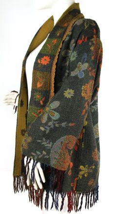 This is a J. Peterman Company wool paisley & floral patterned multi-colored kimono style open front sweater with fringed hem and sleeves, size 6. This sweater is in excellent condition and has lined cotton sleeves. Appears to be generously sized (please see measurements); Length (from top of shoulder to bottom front hem): 31"-includes fringe Chest (pit to pit): 23" across Waist: 22" across Bottom hem: 20" across Sleeves (from top of shoulder seam to cuff): 19" & 23" with fringe Back shoulders (s Wizard Fashion, Fringe Sleeves, J Peterman, Kimono Style Jacket, Open Front Kimono, Clothing Reference, Front Sweater, Open Front Sweater, Fantasy Story