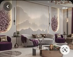 a living room filled with lots of furniture next to a wall covered in purple flowers