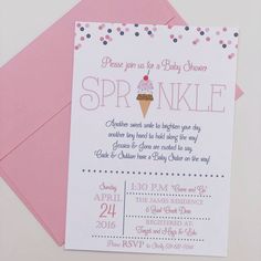 a pink and white baby shower with an ice cream cone on it's card