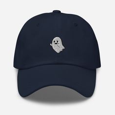 "GHOST. Ghost Baseball Hat. Embroidery Ghost Hat. Boo Hat. Flying Ghost Hat. Dad Hat. Baseball Cap. Spooky Ghost Hat. Cute Ghost Design Hat. EMBROIDERED CAP MADE ESPECIALLY FOR YOU. CHOOSE YOUR FAVORITE DESIGN AND COLOR AND YOU WILL HAVE A PERFECT ACCESSORY FOR EVERY DAY. EACH PRODUCT IS MADE TO ORDER TO REDUCE THE ENVIRONMENTAL IMPACT. PRODUCT: OUR DAD CAPS ARE A 100% COTTON PRODUCT, A TRADITIONAL 6 PANEL BASEBALL CAP, 3 ⅛\" (7.6 cm) CROWN, WITH AN ADJUSTABLE METAL BUCKLE. HOW TO ORDER: USE THE Ghost Baseball, Ghost Hat, Flying Ghost, Ghost Ghost, Embroidered Cap, Ghost Design, Spooky Ghost, Hat Embroidery, Hat Baseball