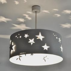 a ceiling light with stars on it