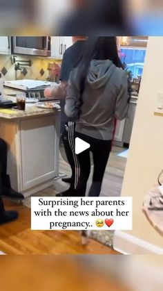 two women in the kitchen talking to each other