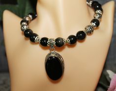 Necklace for women Choker, Obsidian AA+ gemstones, Tibetan Silver plated metal beads and Silver pendant, Black color, Handmade, Unique, Every day and Festive. Bohemian Black Beads Gems And Cabochons Gift, Bohemian Black Beads, Gems, And Cabochons For Gift, Elegant Black Beads, Gems, And Cabochons For Gifts, Black Beaded Necklaces With Stones As Gift, Black Beaded Stone Necklaces For Gifts, Elegant Black Beaded Necklaces With Stones, Black Beaded Necklace With Stones, Elegant Obsidian Jewelry With Polished Beads, Black Spiritual Gemstone Beads