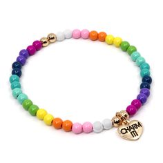 What's their favorite color? All of them? We have just the thing! A Rainbow Beaded Stretch Bracelet, perfect for charming and stacking. Add charms to this bracelet and customize their collection! 4mm beads on 6" length bracelet WARNING: Choking Hazard - Small parts. Not for children under 3 years. Charm It, Beads Bracelet Design, Heart Chain, Rainbow Beads, Pony Beads, Gold Collection, Beaded Stretch Bracelet, Jewelry Patterns, The Thing