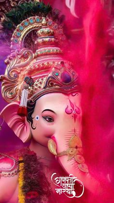 an elephant is painted in pink and gold with feathers on it's head,