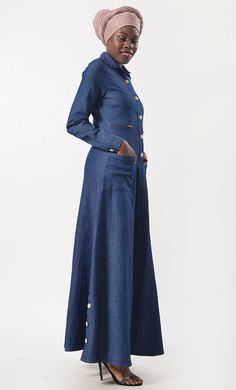 Featuring a Metal Sheen buttons opening at the front, defined 2pockets and beautiful collar neck detailing. This versatile dress will keep you looking polished at the office, on dinner dates or weekend outings. Fabric: Denim This abaya has full sleeves with cuffs. This abaya has lapel collar neckline The fabric is light medium-soft denim, and looks very trendy on an dress. Wash Care: Cold wash Only *INCLUDED POCKETS FOR BETTER UTILITY* Complete The Look:- Looking for something special to glam yo Elegant Collared Denim Dress For Work, Elegant Denim Dress With Button Closure For Work, Elegant Button-up Denim Dress For Spring, Elegant Denim Dress With Button Closure, Denim Button-up Dress For Work, Chic Button-up Denim Dress With Pockets, Elegant Button-up Denim Dress For Fall, Elegant Button-up Denim Dress With Pockets, Elegant Denim Dress With Button Closure For Fall