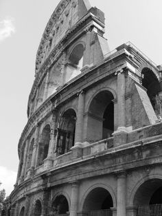 an old building with many arches and pillars