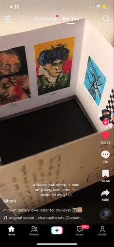 an open box with some pictures on it