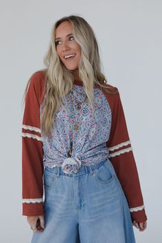 Channel your inner bohemian goddess with the Wonder Valley Mix Print Top! You’ll love this effortless and adorable boho piece all year round! Comfortable, cozy fabric with so cute print and lace details Loose and oversized pullover top silhouette Classic round neckline with loose long sleeves Adorable lace trim along sleeves and bottom hem for added boho style Pair with: Floral Textured Padded Bralette, The Signature Flare, Wrapped Up In Color Knit Cardigan and Dreamscape Layered Necklace. *Due Wonder Valley, Boho Essentials, Bralette Outfit, Padded Bralette, Cozy Fabric, Moon Collection, Oversized Pullover, Layered Necklace, Mixing Prints