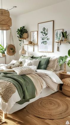 a bedroom with white walls and wooden flooring, plants on the wall above the bed