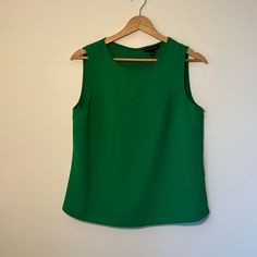 Size Small, Tank Top Blouse From Banana Republic In Great Condition. Never Worn But I Took The Tags Off When I Bought It. Fitted Green Tank Blouse, Green Sleeveless Top For Work, Green Sleeveless Blouse For Workwear, Elegant Green Tank Top, Chic Green Tank Blouse, Green Sleeveless Blouse For Work, Green Banana, Small Tank, Tank Top Blouse