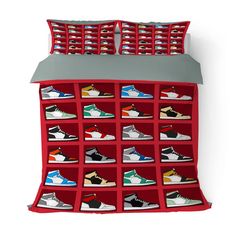 an image of a bed with many pairs of shoes on it and the bottom is red