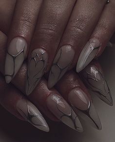 Fall nails 2023 Nails Metalic Design, Metalic Design Nails, Metal Nails Design, Silver Goth Nails, Black And Silver Heart Nails, Assassin Nails, 2yk Nails Ideas, Clear Polish Nail Designs, Metallic Heart Nails