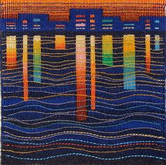 an art work made with beads and thread on a wooden frame, depicting colorful waves