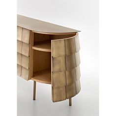 the sideboard is made out of wood and has an unusual shaped design on it