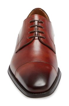 Burnished, water-resistant leather defines a handsome derby built with an arch-support footbed for exceptional comfort.Runs large; order 1/2 size down. Lace-up style Cushioned footbed Leather upper and lining/synthetic sole Made in Portugal Men's Shoes Fitted Brown Oxfords With Removable Insole, Fitted Dress Shoes With Leather Footbed For Derby, Classic Fitted Dress Shoes With Cushioned Footbed, Up Styles, Arch Support, Cognac, Derby, Dress Shoes Men, Oxford Shoes