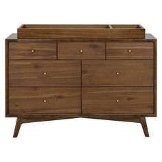 The Palma 7-drawer double dresser is a sophisticated mid-century-inspired design with tapered legs, brushed metal hardware, and smooth-glide drawers. It's a versatile modern piece, providing ample storage space with three top drawers and four larger bottom drawers. Color: Natural Walnut babyletto Palma 7 Drawer 53" W Double Dresser in Brown/Yellow | Size 34.25 H x 53.0 W x 19.0 D in | AllModern Babyletto Palma, Elegant Nursery, Play Wood, Bed Bassinet, Cart Furniture