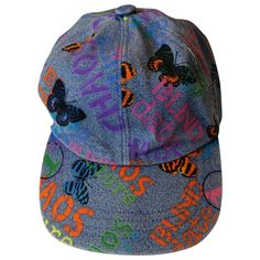 Keep it camp with Versace Jean Couture "Chaos" denim hat, printed with colorful Butterflies and Blind Date written in words. Keep it casual or dress this cap up with leather. Size Medium adjustable hardware. Made in Italy Evening Hat, Dior Boutique, Blind Date, Hat Ideas, Denim Hat, Blind Dates, Purple Satin, White Hat, Purple Velvet