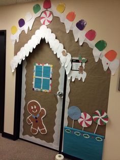 a gingerbread house door decorated with paper decorations