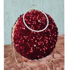 This stunning Party Clutch Bag is embellished with sequin on a maroon /Burgundy velvet base and comes with a American diamond studded wrist holder . This Minaudière Clutch is ideal for parties and weddings and any festive occasion. This Maroon Handmade Embroidered Embellished Sling Purse can be used with or without the metal sling that is included. Dazzle through the Day or Evening with this beautifully Handcrafted Wedding Bridal Clutch Bag. Perfect for a Bride, Bridal Gift, Bridal Clutch, Weddi Festive Sequined Bags For Reception, Glamorous Embellished Potli Bag For Reception, Hand Embellished Potli Bag For Festival Celebrations, Hand Embellished Potli Bag For Festivals, Glamorous Embellished Evening Potli Bag, Glamorous Embellished Potli Bag For Evening, Glamorous Embellished Potli Bag For Festive Occasions, Glamorous Embellished Festive Potli Bag, Festival Party Sequin Fabric With Mirror Work