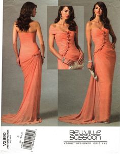 a woman in an orange dress is posing for the camera