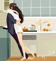 a man and woman hug in the kitchen while standing next to each other on a counter