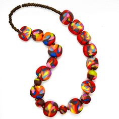 Each Polymer Clay Bead is uniquely handmade one at a time. Artistic Adjustable Choker Jewelry, Multicolor Resin Bead Jewelry, Colorful Round Beaded Resin Jewelry, Artistic Multicolor Necklaces With Large Beads, Artsy Multicolor Beaded Jewelry, Artistic Multicolor Beaded Necklaces, Beaded Necklaces As Wearable Art Gifts, Beaded Necklace As Wearable Art Gift, Wearable Art Beaded Necklace As A Gift