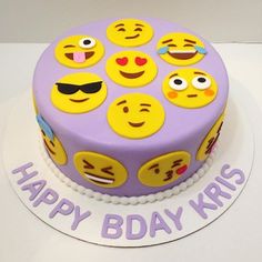 a birthday cake decorated with emoticions and the words happy bday kriss