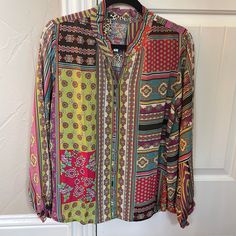 Gorgeous Johnny Was Silk Blouse. Size Medium. New, With Tags, In Original Bag. Accidentally Ordered 2. Have Matching Joggers As Well. Multicolor V-neck Workwear Blouse, Multicolor V-neck Blouse For Work, Long Sleeve Tops With Vibrant Print For Work, Bohemian Multicolor Blouse For Workwear, Bohemian Multicolor Blouse For Work, Red V-neck Blouse With Vibrant Print, Multicolor Printed Blouse For Work, Multicolor Printed Workwear Blouse, Spring Red Blouse With Colorful Pattern