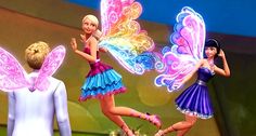 three cartoon characters are standing in front of a stage with two fairy like people on it