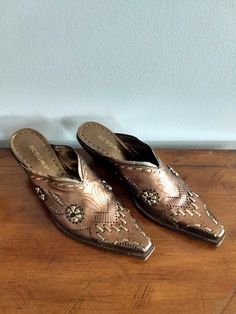 "Beautiful brown metallic decorated leather shoes, Style: Western Slip-On. Brand: BCBG Perforated and embellished leather. *Size: 9 *Heel height; 2.5\" *Ball of foot: 3.5\" Previously own. Slightly used. Thank you for visiting my store. You can also visit my MargaretJewelryShop or http://jewelryandclothing.net/" Cute Cowgirl Boots, Womens Loafers, Slip On Mules, Western Leather, Shoes Brown, Shoe Gifts, Cowgirl Boots, Leather Slip Ons