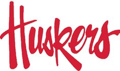 the word huskers written in red on a white background