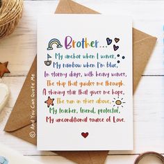 a card with the words brother written in different colors on it next to some craft supplies