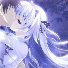 an anime couple kissing in front of a full moon