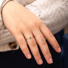 Elevate your style with our Round Cut Emerald and Diamond 14k/18k Solid Gold Ring. Perfect for stacking or as a statement piece.  Celebrate love with this stunning emerald and diamond ring. Shop now and cherish forever! Material: Solid Real Gold (Not gold plated or gold fill) Available Gold Karat: 14K (585), 18K (750)  Available Gold Colors: Yellow, rose, white Gemstones: Natural emerald, natural diamond Number of Emeralds: 1 Emerald shape: Pear Emerald size: 3 mm Emerald CTW: 0.15 Ct Diamond Co 14k Gold Emerald Ring For Proposal, Gift Emerald Ring With Round Band, Green 14k Gold Ring For Proposal, Dainty 14k Gold Birthstone Ring For Proposal, Emerald Ring With Round Cut As Gift, 14k Gold Round Cut Emerald Ring, Yellow Gold Emerald Ring For Proposal In May, Gift Stackable Emerald And Diamond Ring, Yellow Gold Emerald Ring For May Birthstone Proposal